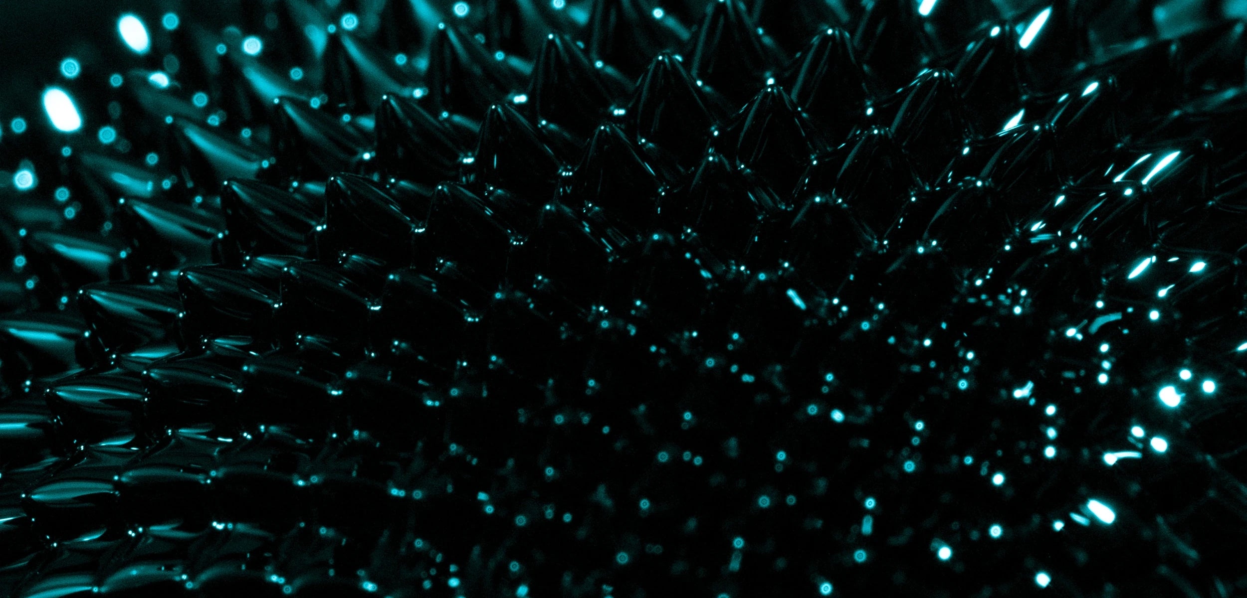 Close-up of a textured surface with blue highlights